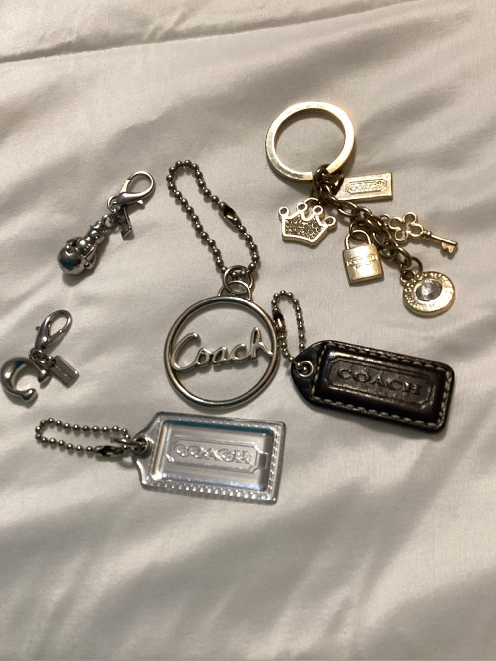 COACH key tags and charms